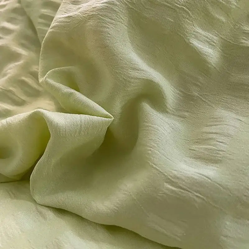 Pastel green and white lace bubble cotton bedding set with soft pale green crinkled cotton fabric and subtle texture