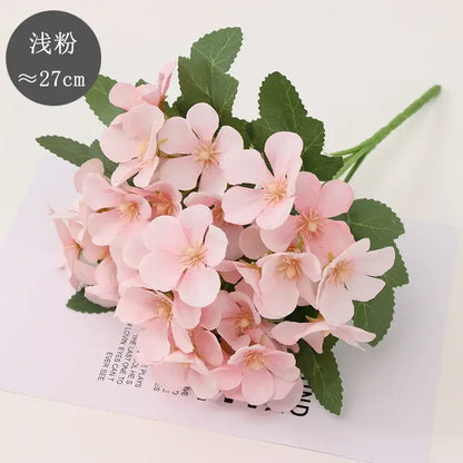 A delicate bouquet of pink begonia flower dry with green leaves and soft petals for living room decor embossing