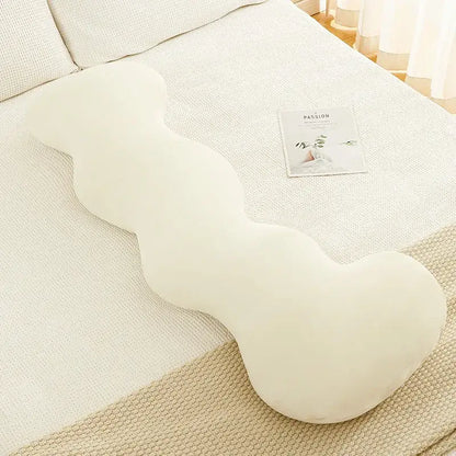 Cream-colored ice cream wavy plush pillow with soft texture by decorbites for cozy bedroom decor
