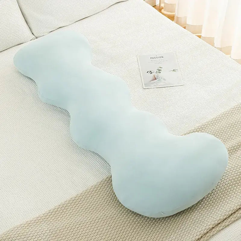 A soft light blue ice cream wavy plush pillow with plush fabric finish for decorbites ice cream bedroom decor