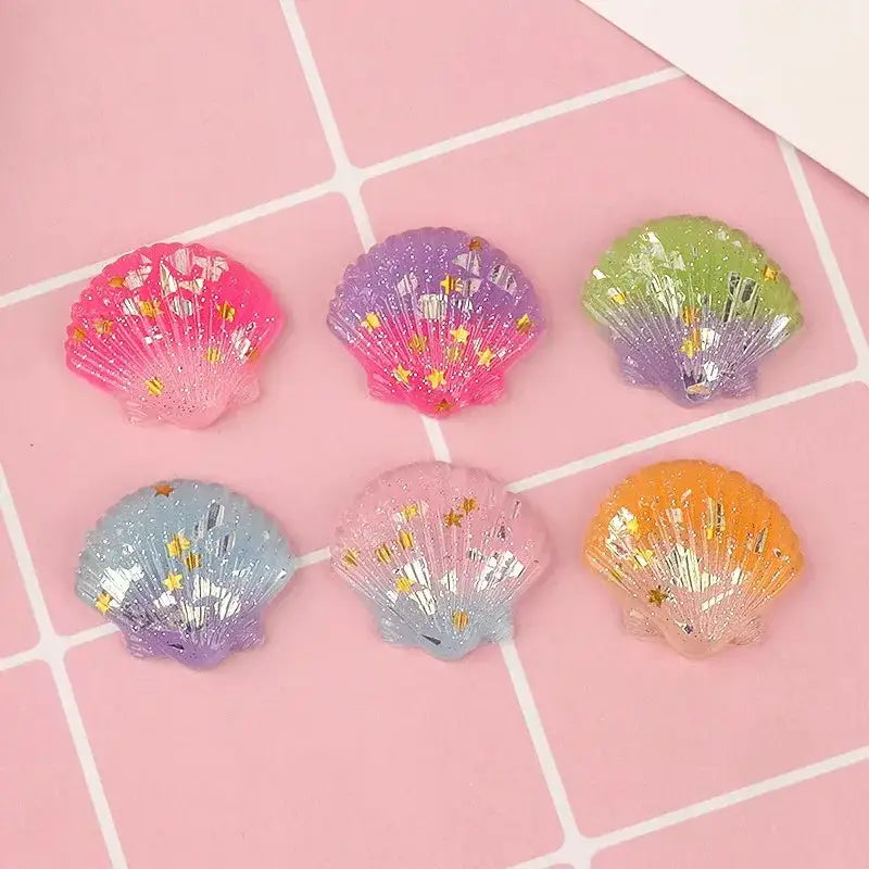 Pastel-colored resin colorful pearl shells with glittery gold star accents for pearl shells beach decor and bedroom art