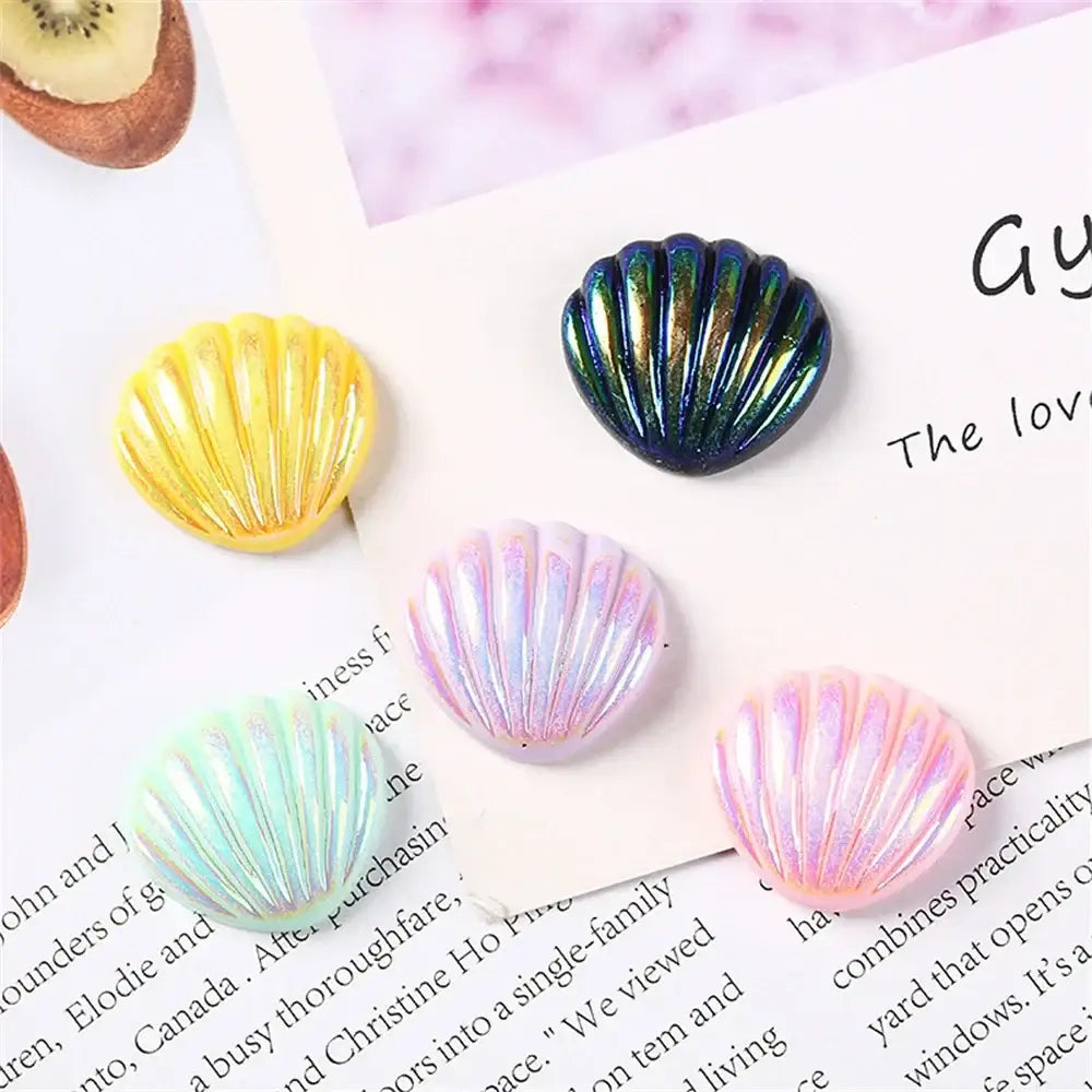 Pastel iridescent pearl shells beach decor magnets in vibrant yellow, blue-green, pink, and mint colors for bedroom art