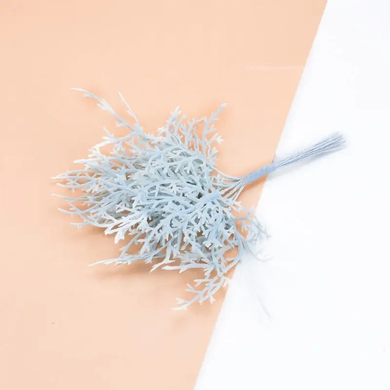 A delicate light blue artificial plants arrangement with intricate branching stems from decorbites 10pcs artificial set for living room decor