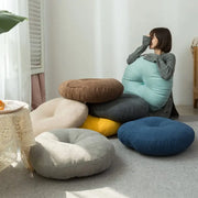 A collection of pastel and earthy decorbites linen round floor cushions for living room meditation and decorbites linen round use