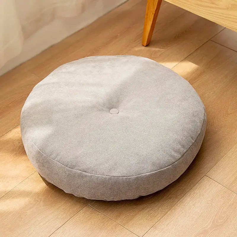 Gray decorbites linen round floor cushion with plush fabric and subtle tufted center for living room meditation use