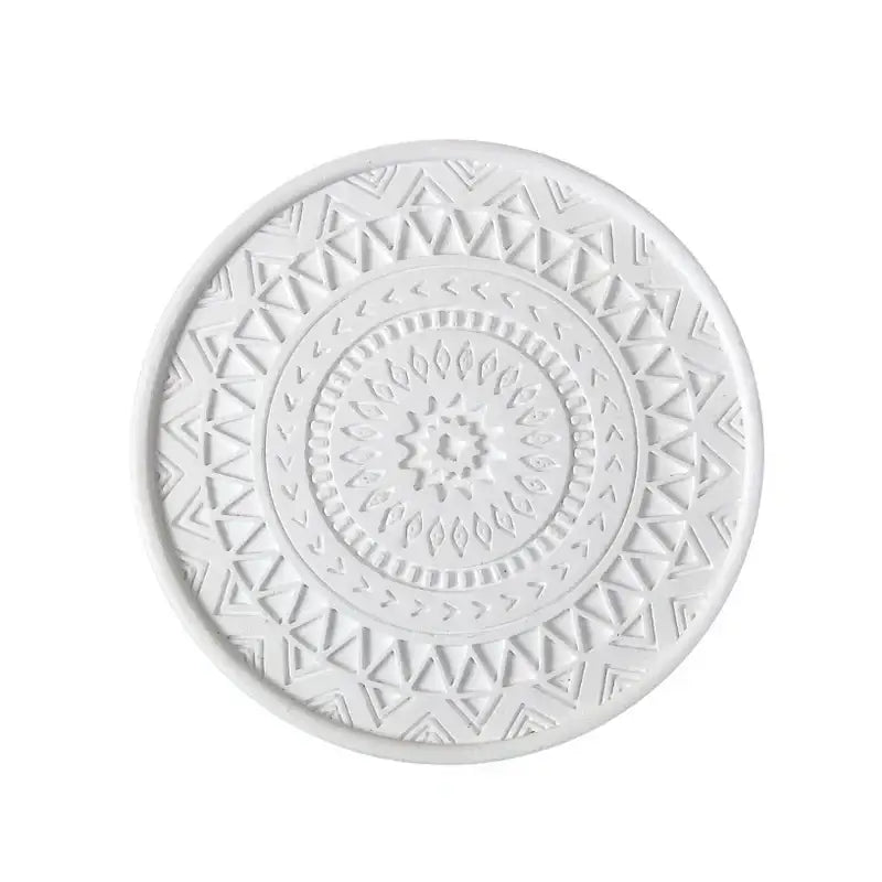 White pastel mandala diatomite round coaster with intricate embossed patterns from decorbites diatomite round coasters