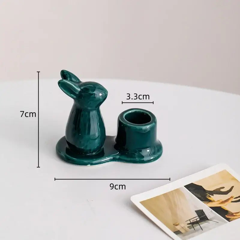 Glossy dark green bunny rabbit ceramic candle holder with integrated cup for dining room decor