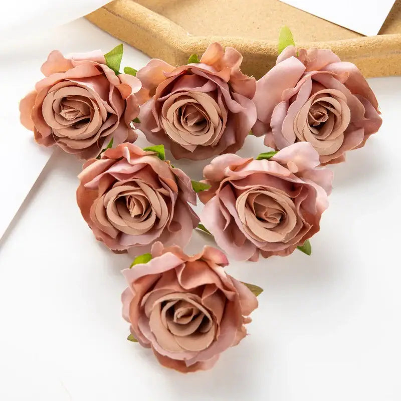 Delicate blush pink artificial flowers with soft layered petals and green stems from decorbites 100pcs multicolor silk set