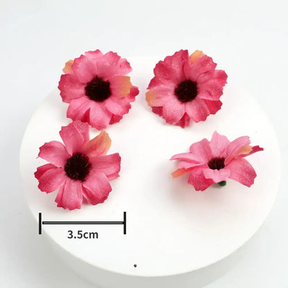 Pastel pink and lavender decorbites mini daisy artificial flowers with dark centers and textured fabric material for wedding decor