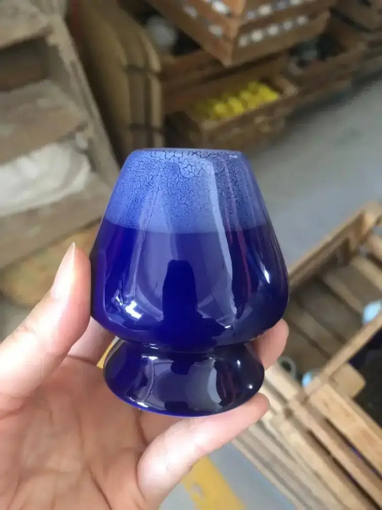 Deep cobalt blue ceramic matcha whisk stand with crackled glaze and fluted rounded base for tea bowl holder set