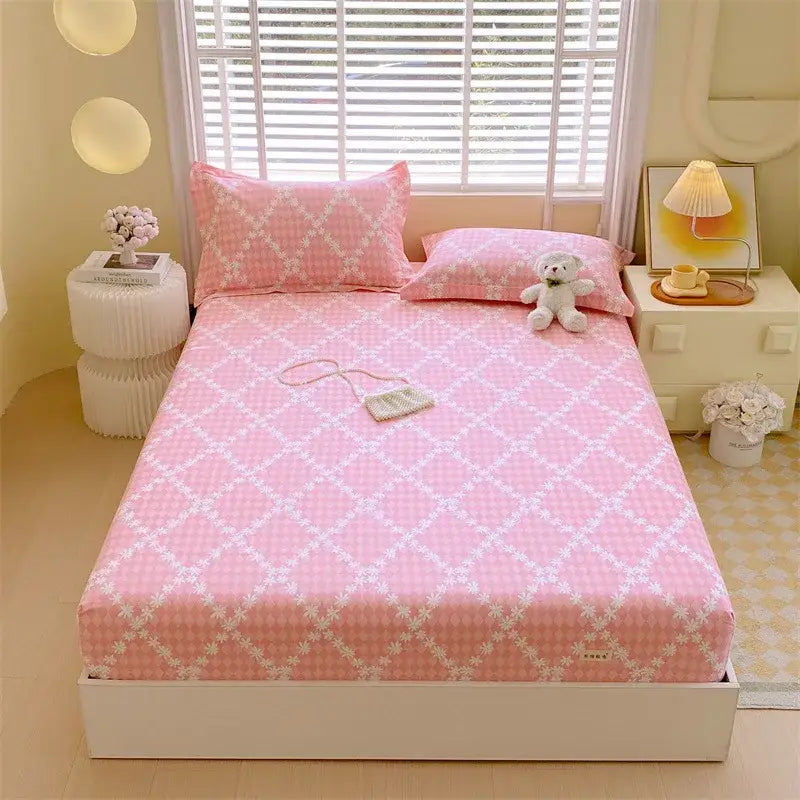 Pastel pink and blue cotton striped fitted sheet with pink diamond pattern and white floral accents for bedroom bedding