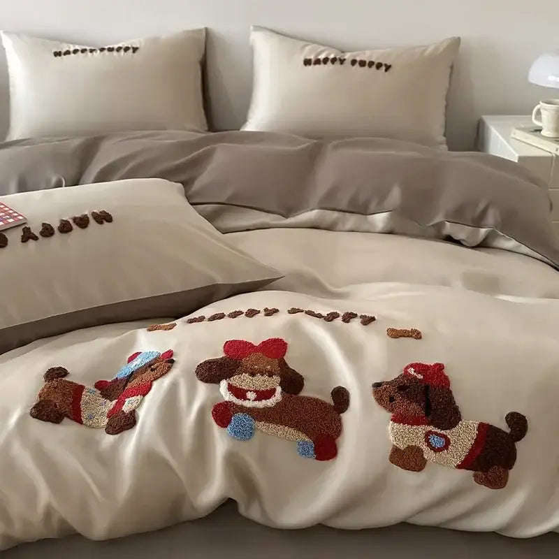 Cream-colored duvet cover with three plush embroidered puppies in brown and red from pastel pink cartoon embroidery cotton bedding set by decorbites