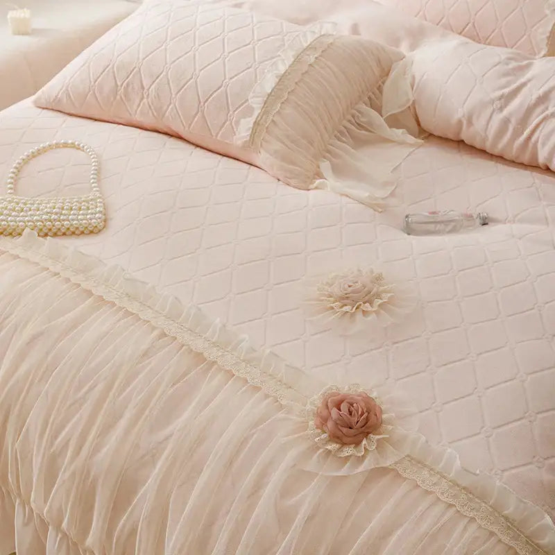 Cream-colored quilted bedding set with delicate lace trim and embroidered roses from decorbites cozy velvet lace collection