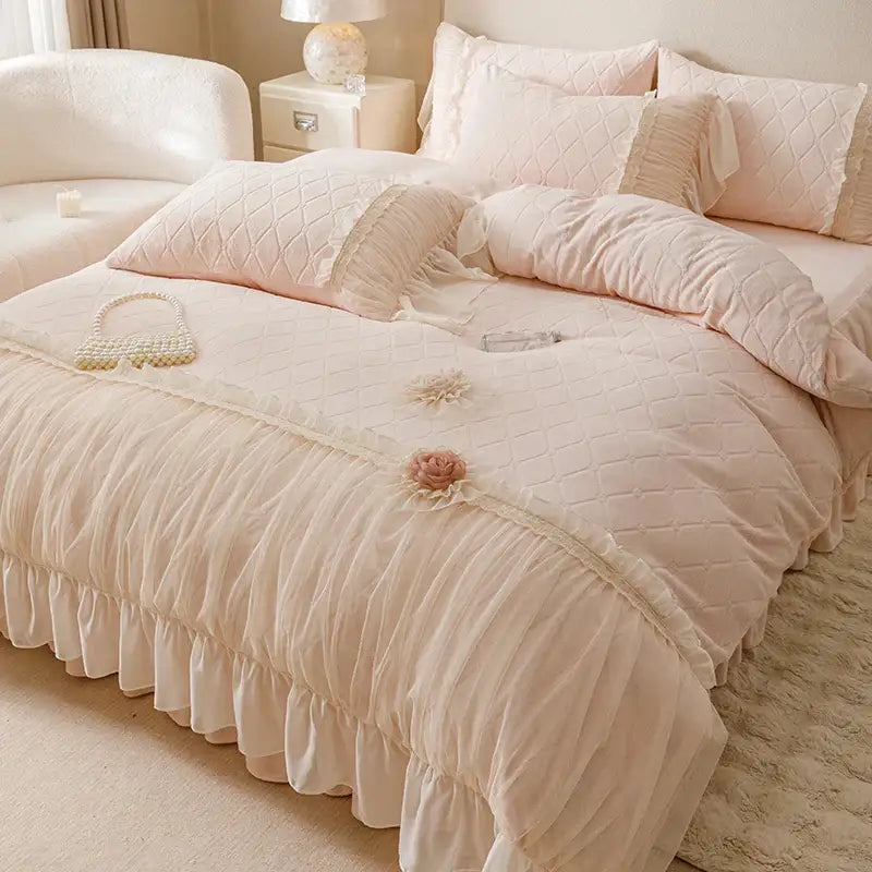 Pastel pink cozy velvet lace bedding set with quilted texture ruffled trim and delicate floral embellishments by decorbites cozy velvet