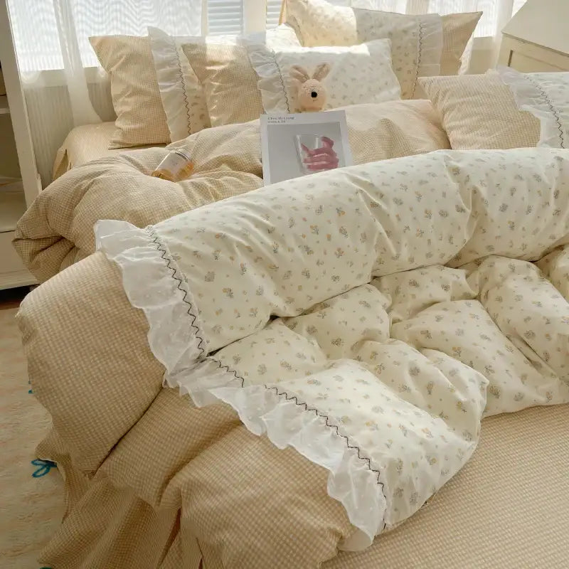 Cream-colored bedding set with cotton small florals pattern and white lace trim in pastel pink and cream decorbites cotton small