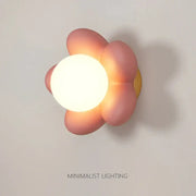 Pastel pink cream flower wall lamp with glowing white circular light for bedroom lighting decorbites cream flower decor