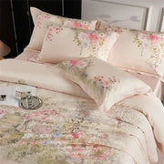 Pastel pink floral egyptian cotton bedding set with delicate rose and botanical prints on satin-like duvet cover