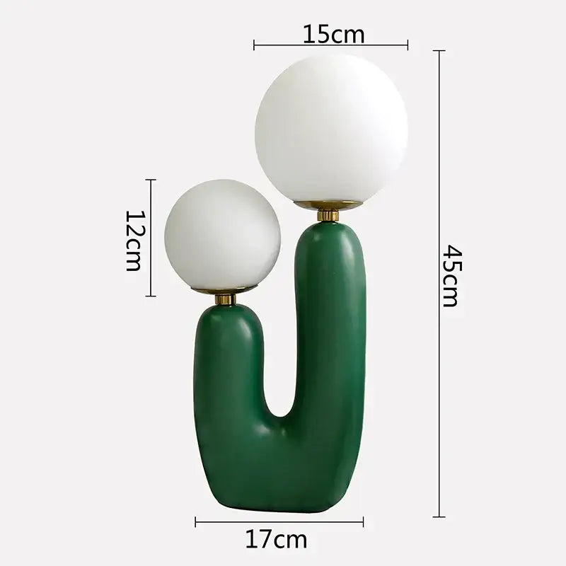 Modern green ceramic ball table lamp with two white spherical glass ball shades for bedroom use