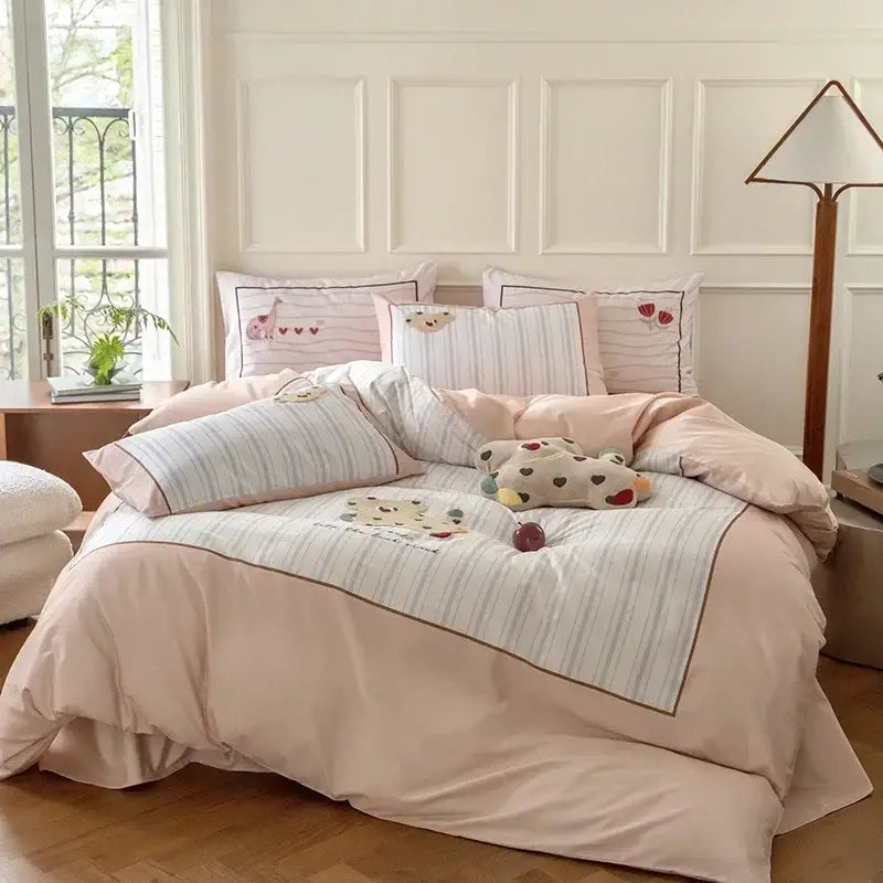 Pastel pink and gray cotton embroidered bedding set with striped duvet cover and animal motifs by decorbites cotton