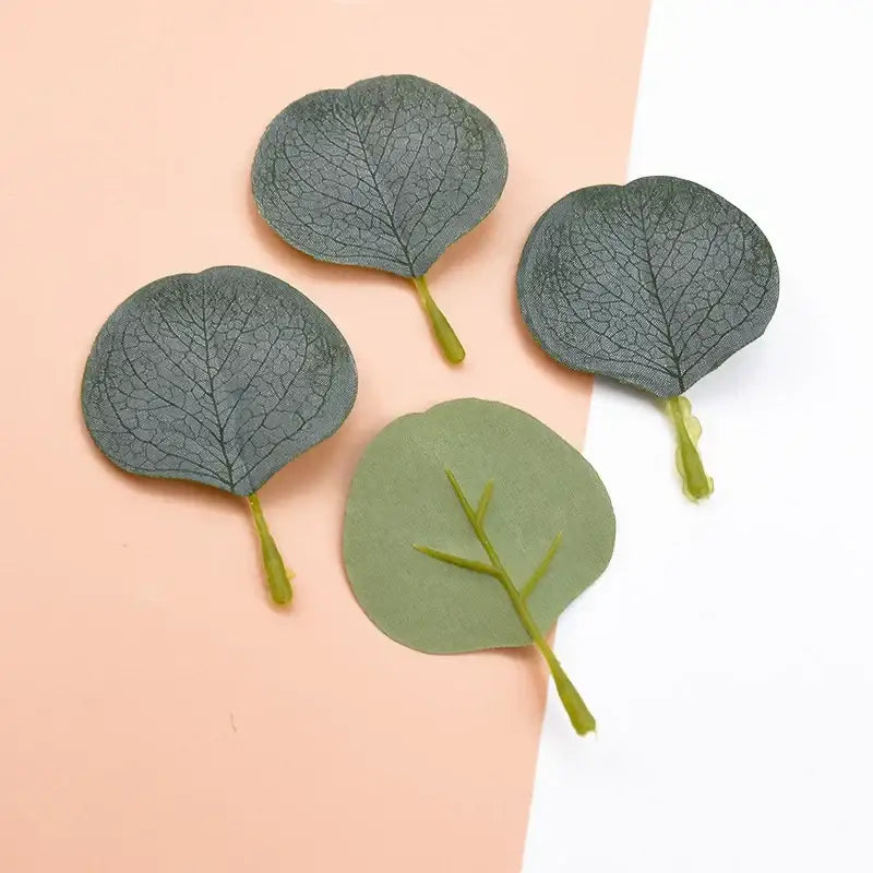 Pastel pink and green silk leaf artificial plants with detailed veins and matte finish for elegant home decor