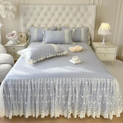 Light blue lace bed sheet skirt with delicate white floral embroidery and scalloped edges for pastel pink sheet set