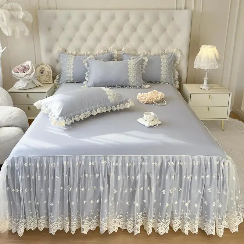 Light blue lace bed sheet skirt with delicate white floral embroidery and scalloped edges for pastel pink sheet set
