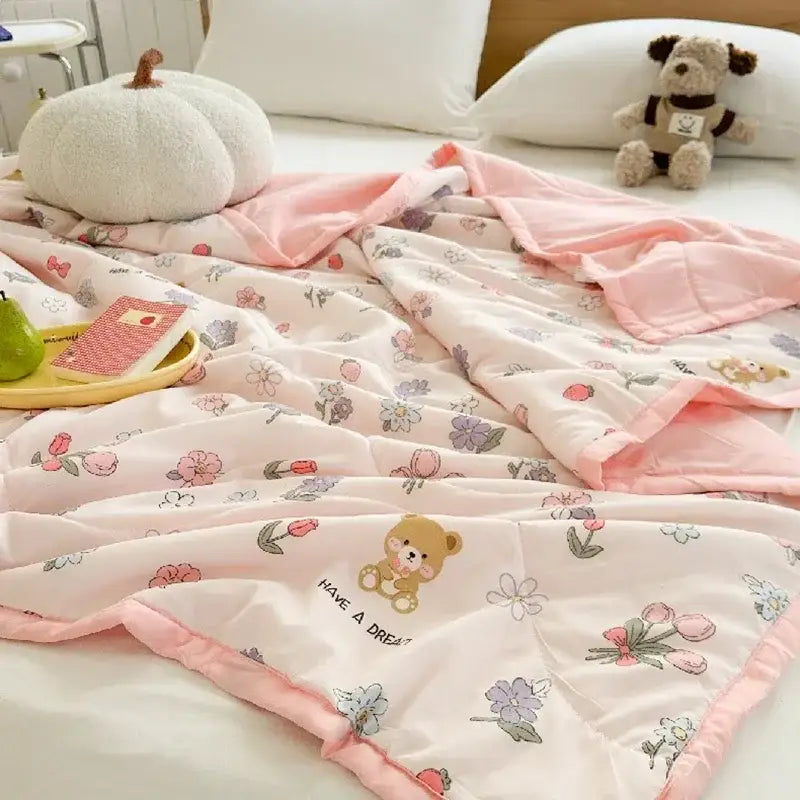 Pastel pink and white cartoon bear printed summer quilt with plush texture featuring decorbites cartoon bear design