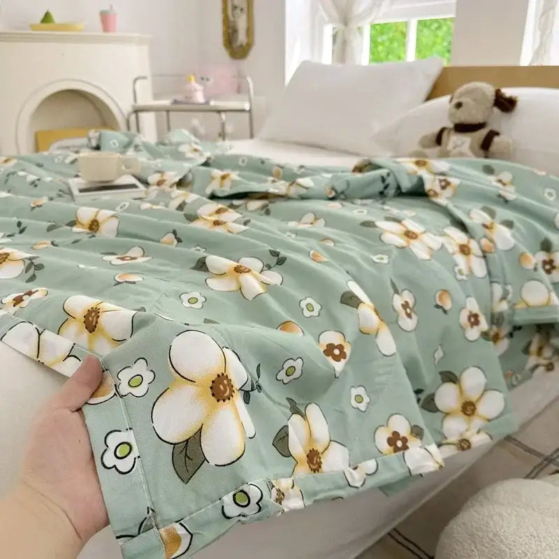 Pastel pink and white cartoon bear printed summer quilt with a soft mint green floral patterned back for decorbites cartoon bear fans
