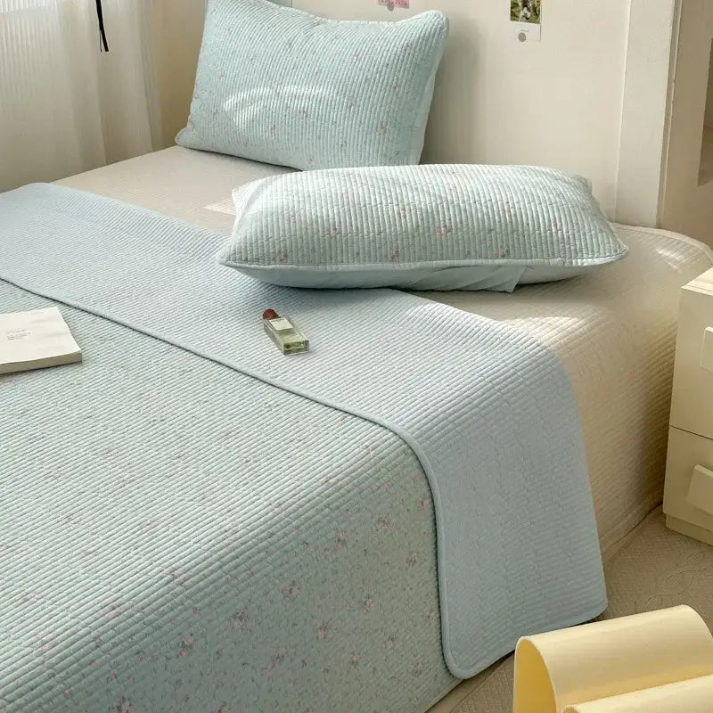 Light blue quilted cotton bed cover with subtle pink floral patterns soft anti-slip tatami mat for bedroom
