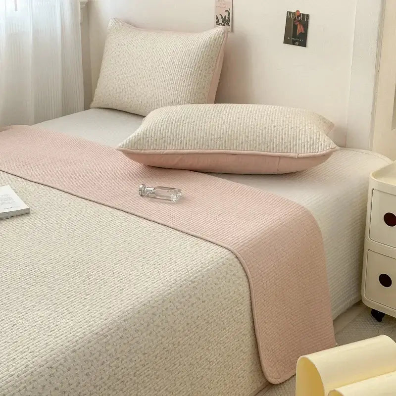 Soft pink cotton bed cover with subtle woven pattern and anti-slip texture for tatami mat bedrooms