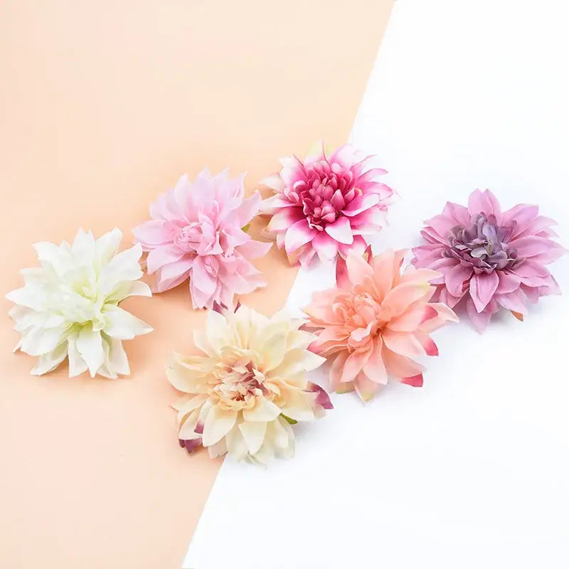 A collection of pastel silk gerbera decorative flowers in white pink peach and lavender for wedding home decor