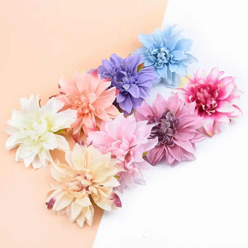 A collection of pastel silk gerbera flowers in white peach pink lavender and blue for wedding and living room decor