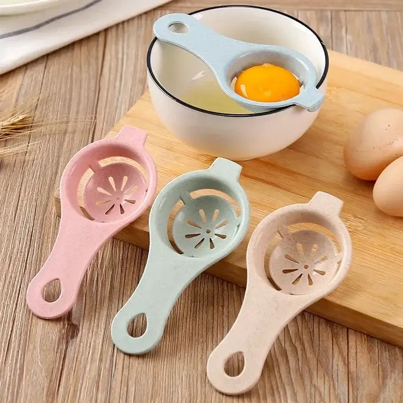 Pastel-colored plastic egg white separator with star-shaped perforated design for easy egg white separation