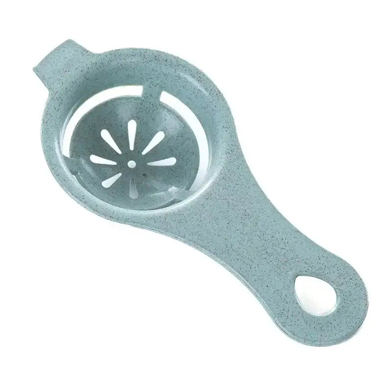 Light blue speckled plastic egg white separator with handle and star-shaped cutout for easy white separation