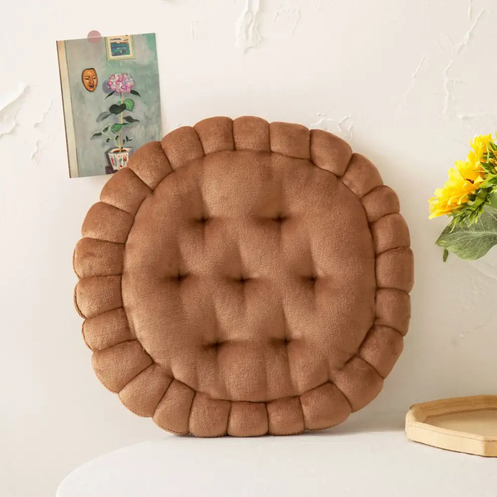 Brown round decorbites cookie biscuit cushion with tufted center and ruffled edge for living room decor