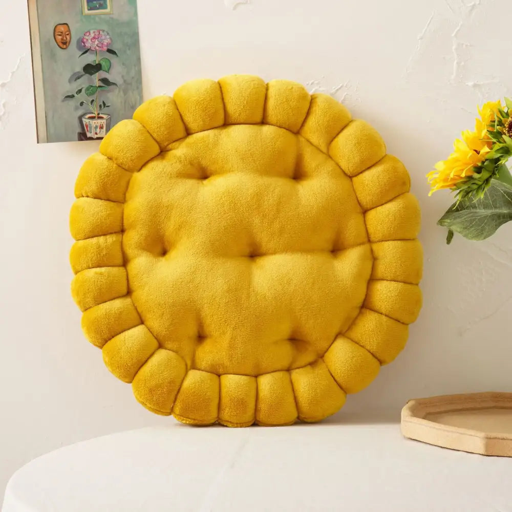 A plush mustard-yellow sunflower-shaped biscuit cushion soft with tufted center and ruffled edges for living room decorbites cookie biscuit