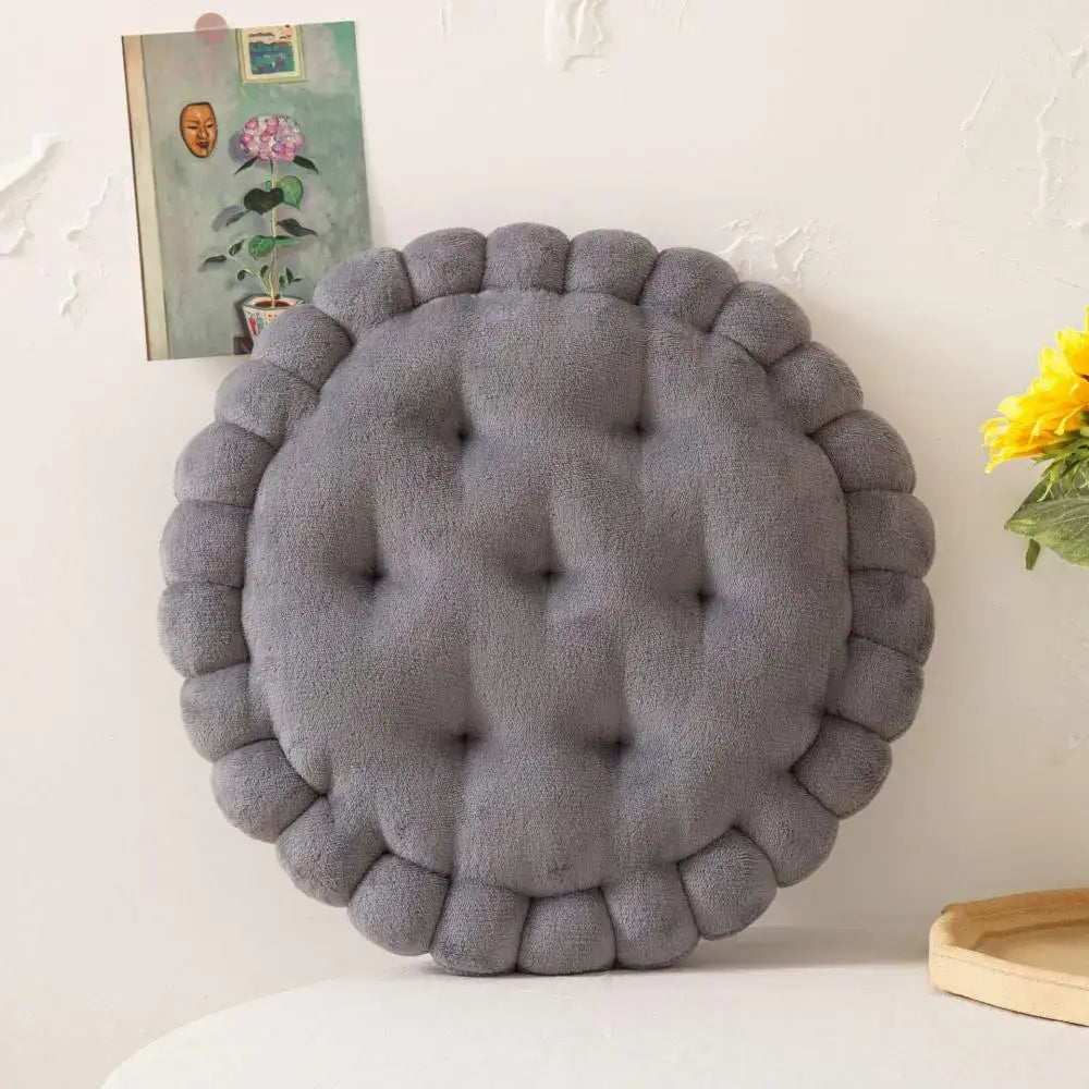 Gray tufted cookie biscuit cushion with plush textured surface and scalloped edge for soft living room decorbites throw pillow
