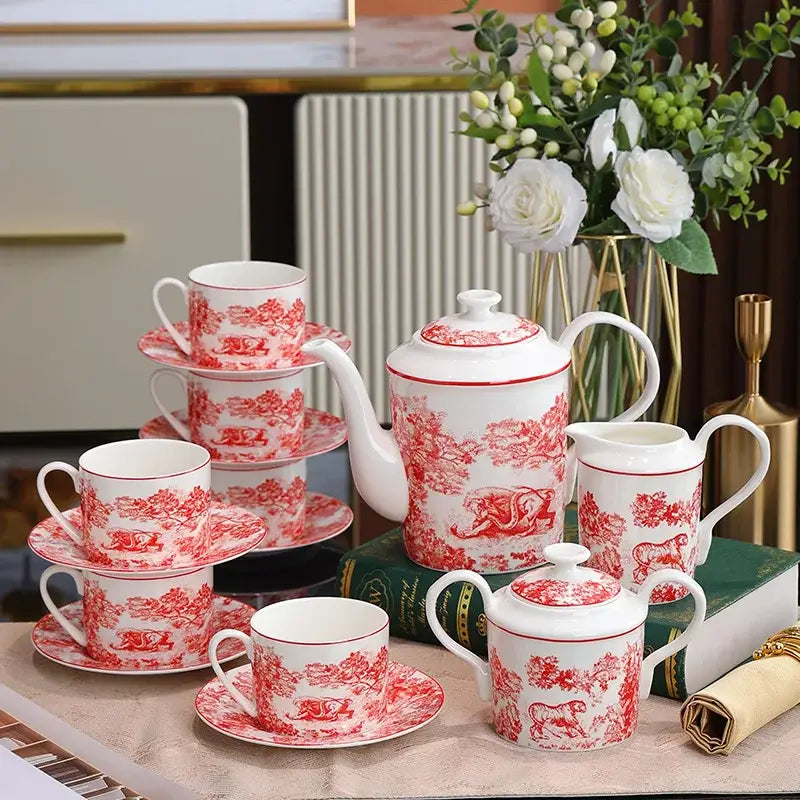 White ceramic teapot with red pastoral scene pattern and gold rim from decorbites jungle lion bone tea set