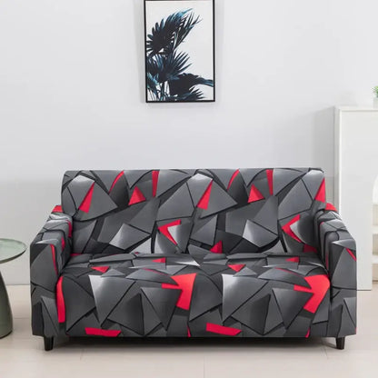 A sleek gray and red geometric-patterned stretch sofa cover for living room with modern angular design