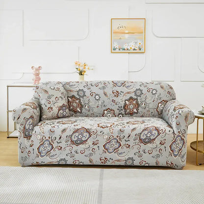 Gray sofa cover with intricate brown blue and white floral and paisley patchwork mandala print for living room use