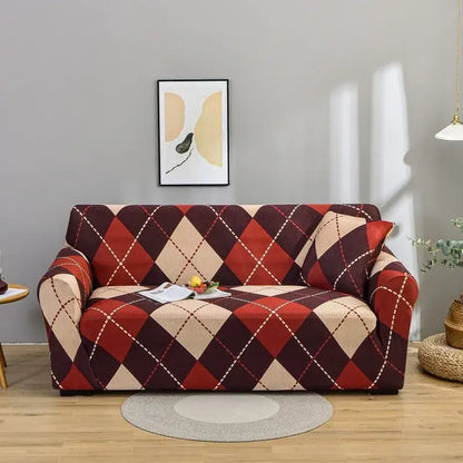 A cozy sofa with a stretchy argyle-patterned patchwork mandala printed slipcover in bold red and beige tones