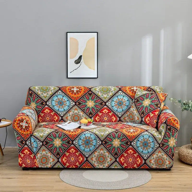 A vibrant stretchy sofa cover with colorful mandala geometric patterns in reds blues oranges and greens for living room