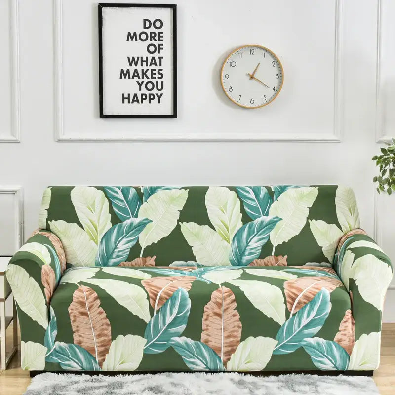 Green sofa cover with vibrant teal cream and brown tropical leaf pattern for patchwork mandala stretch slipcover