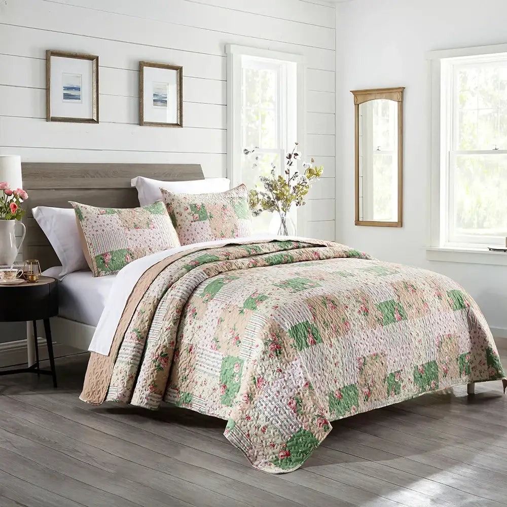 Patchwork rust and cream floral coverlet bedding set featuring a soft vintage floral pattern in muted greens and pinks