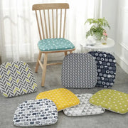 A collection of six patterned cotton hemp chair cushions in various colors for dining chair seating by decorbites