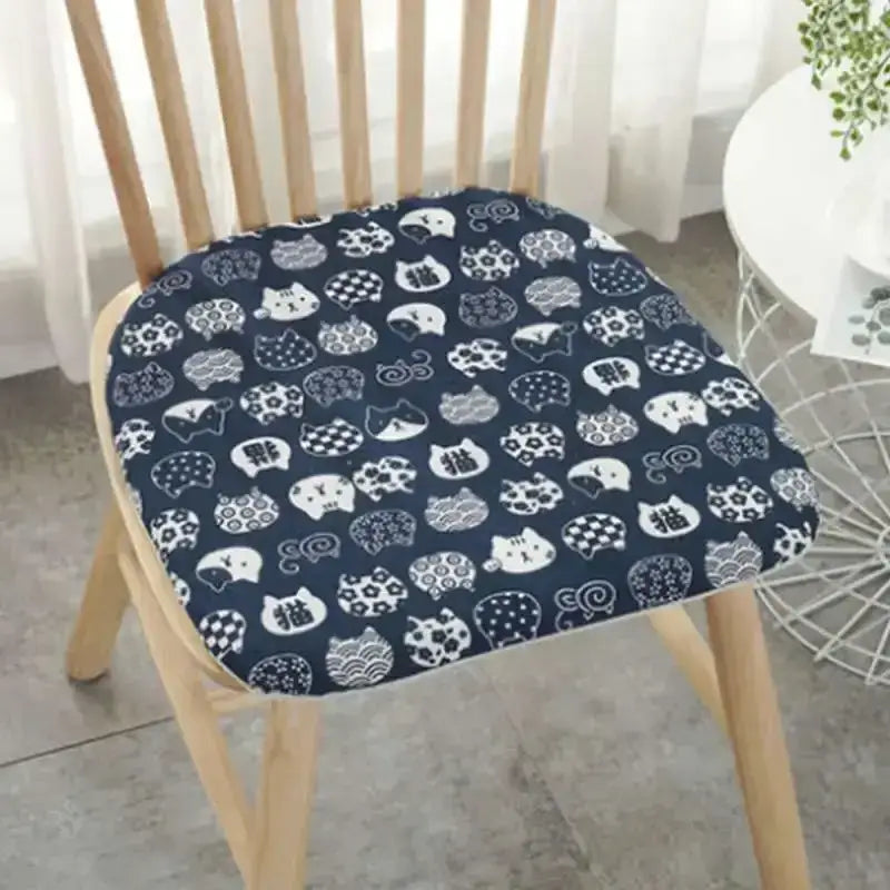 Navy blue cotton hemp chair cushion with white cat illustrations and japanese characters for dining chair use by decorbites