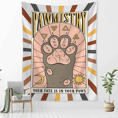 A decorative wall tapestry featuring a stylized cartoon cat claw paw print with astrological symbols and pawmistry text