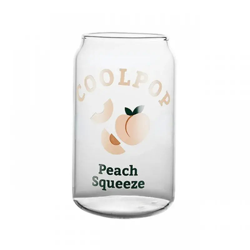 Clear glass cup shaped like a soda can with peach fruit prints and beige coolpop lettering for dining room use