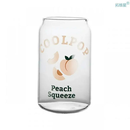 Clear glass cup shaped like a can featuring peach fruit prints and coolpop peach squeeze text for dining room use