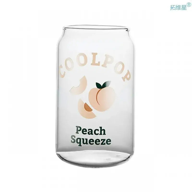 Clear glass cup shaped like a can featuring peach fruit prints and coolpop peach squeeze text for dining room use